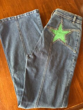 We The Free Blue Flare Jeans with Green Star Patch Size 31
